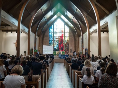 Crowded Chapel and St. Luke's looking towards pulpit