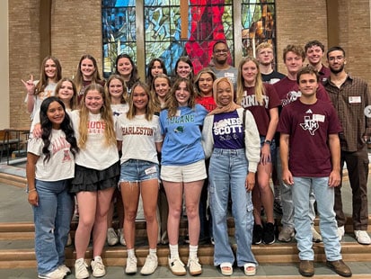 St. Luke's Alumni in their high school shirts