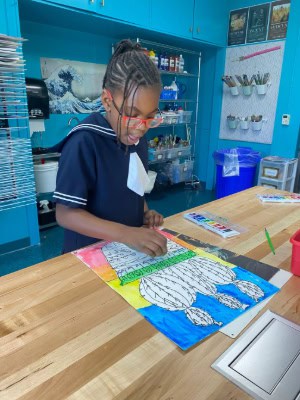 African American girl in art class at St. Luke's Episcopal School