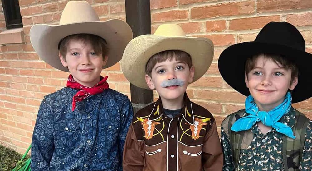 Boys dressed as cowboys